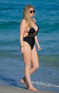 Josie Goldberg in a Black Swimsuit