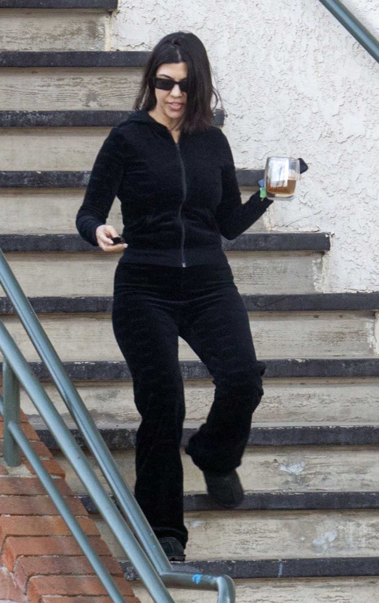 Kourtney Kardashian in a Black Outfit