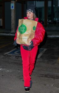 Kyle Richards in a Red Puffer Jacket