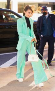 Lily Collins in a Neon Green Pantsuit