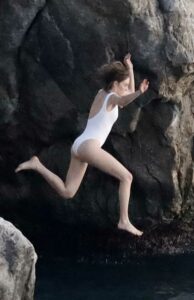 Maya Hawke in a White Swimsuit