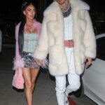 Megan Fox in a Pink Cardigan Arrives at Catch Steak with Machine Gun Kelly in Los Angeles 12/19/2022
