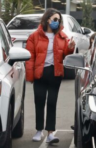 Mila Kunis in a Red Jacket