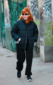 Natasha Lyonne in a Black Puffer Jacket