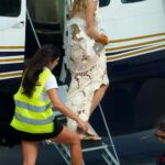 Rita Ora in a White Lace Maxi Skirt Arrives at St. Barts 12/29/2022