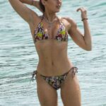 Tallia Storm in a Patterned Bikini on Sandy Lane Hotel’s Beach in Barbados 12/27/2022