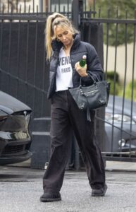 Tish Cyrus in a Black Puffer Jacket