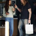 Zoe Saldana in a White Sweater Was Seen Out with Marco Perego in Los Angeles 12/26/2022
