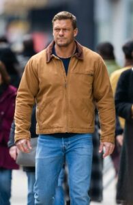 Alan Ritchson in a Caramel Coloured Jacket