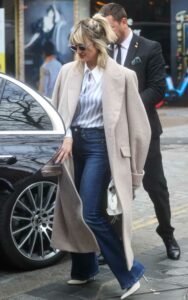 Ashley Roberts in a Striped Blouse