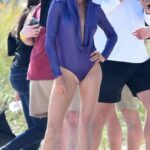 Gisele Bundchen in a Purple Swimsuit with a Hood Does a Photoshoot on the Beach in Florida 01/26/2023