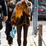 Hailey Bieber in a Brown Leggings Leaves Brunch at the Great White Restaurant on Melrose Ave in West Hollywood 01/16/2023