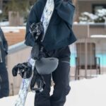 Kylie Jenner in a Black Hoodie Join for a Fun Day of Snowboarding in Aspen 12/31/2022