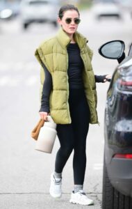 Lucy Hale in an Olive Vest