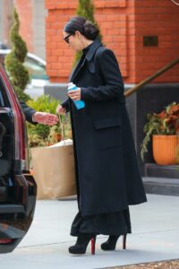 Monica Bellucci in a Black Coat