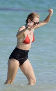 Naomi Watts in a Red and Black Bikini