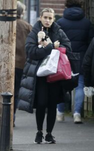 Dani Dyer in a Black Puffer Coat