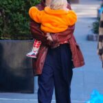 Emily Ratajkowski in a Red Leather Jacket Was Seen Out with Her Son Sylvester in New York City 02/14/2023