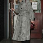 Jenna Coleman in a Chess Print Trench Coat Leaves the Harold Pinter Theatre in London 02/25/2023
