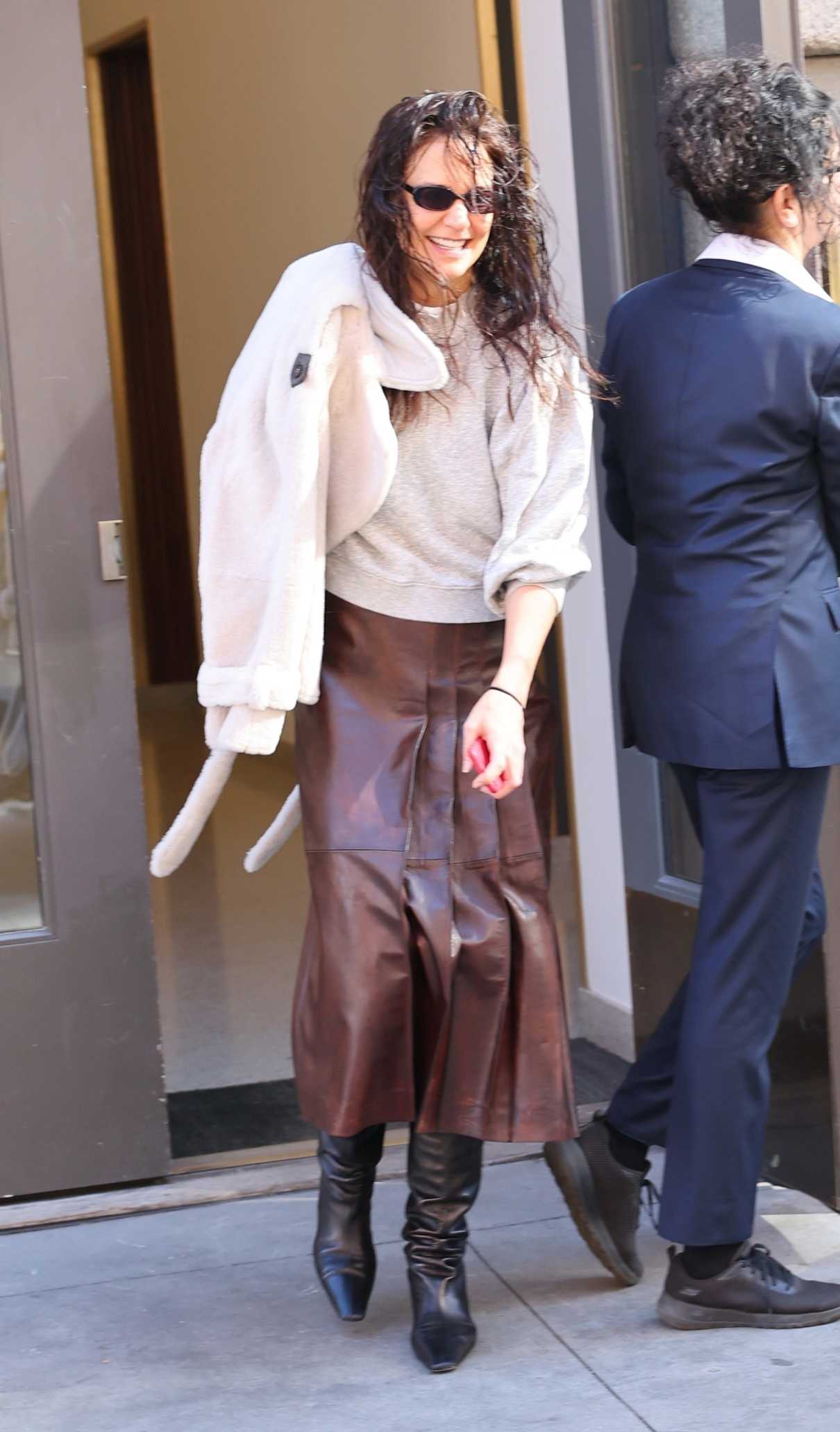 Katie Holmes in a Brown Leather Skirt