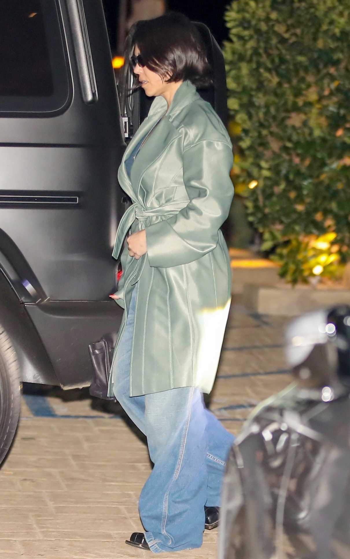Kourtney Kardashian in an Olive Coat Was Seen During a Night Out at ...