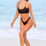 Kylie Jenner in a Black Bikini on the Beach in Turks and Caicos 01/31/2023