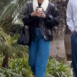 Laura Harrier in a Black Leather Jacket Was Seen Out with a Male Friend in Los Feliz 01/30/2023