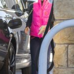 Lori Loughlin in a Bright Pink Vest Stops to Pump Gas in Calabasas 01/31/2023