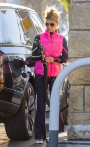 Lori Loughlin in a Bright Pink Vest