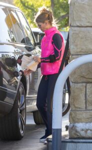 Lori Loughlin in a Bright Pink Vest