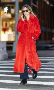 Suki Waterhouse in a Red Fur Coat