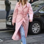 Aimee Lou Wood in a Pink Trench Coat Arrives at Capital Breakfast Radio Studios in London 03/24/2023