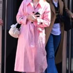Aimee Lou Wood in a Pink Trench Coat Leaves the Global Radio Studios in London 03/24/2023