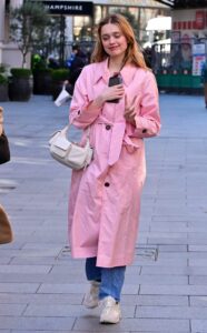 Aimee Lou Wood in a Pink Trench Coat