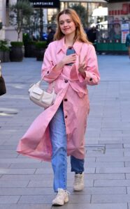 Aimee Lou Wood in a Pink Trench Coat
