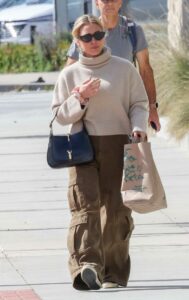 Hilary Duff in a Beige Knitted Turtleneck