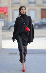 Sara Sampaio in a Black Sweater