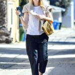 Dakota Fanning in a White Tee Was Seen Out in Los Angeles 03/31/2023