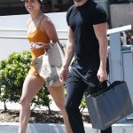 Hayley Erbert in an Orange Workout Ensemble Was Seen Out with Derek Hough in Studio City 04/23/2023