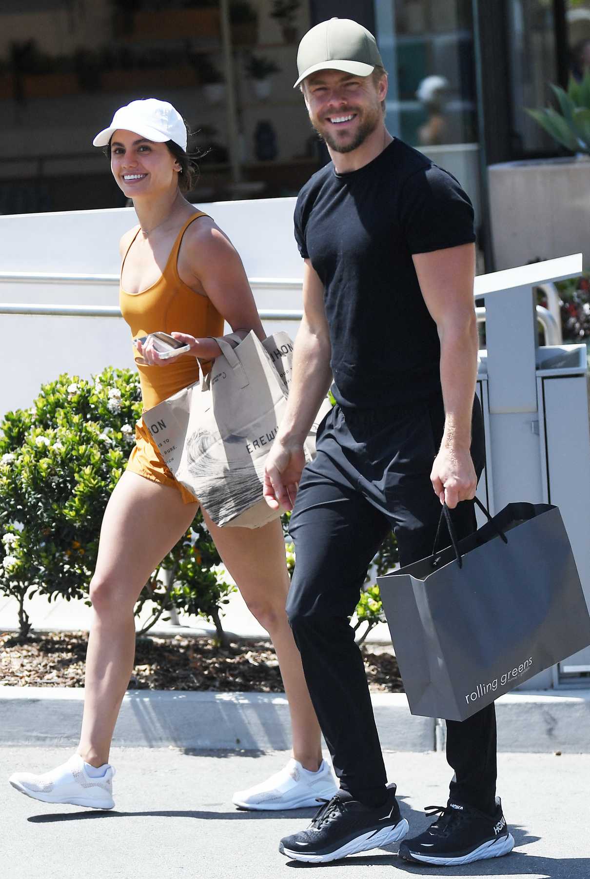 Hayley Erbert in an Orange Workout Ensemble