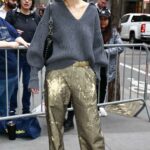 Katie Holmes in a Grey Sweater Leaves the Today Show in New York City 04/12/2023