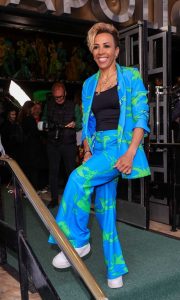 Kelly Holmes in a Bright Blue Printed Trouser Suit