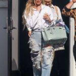 Khloe Kardashian in a Blue Ripped Jeans Leaves a Studio in Calabasas 04/11/2023