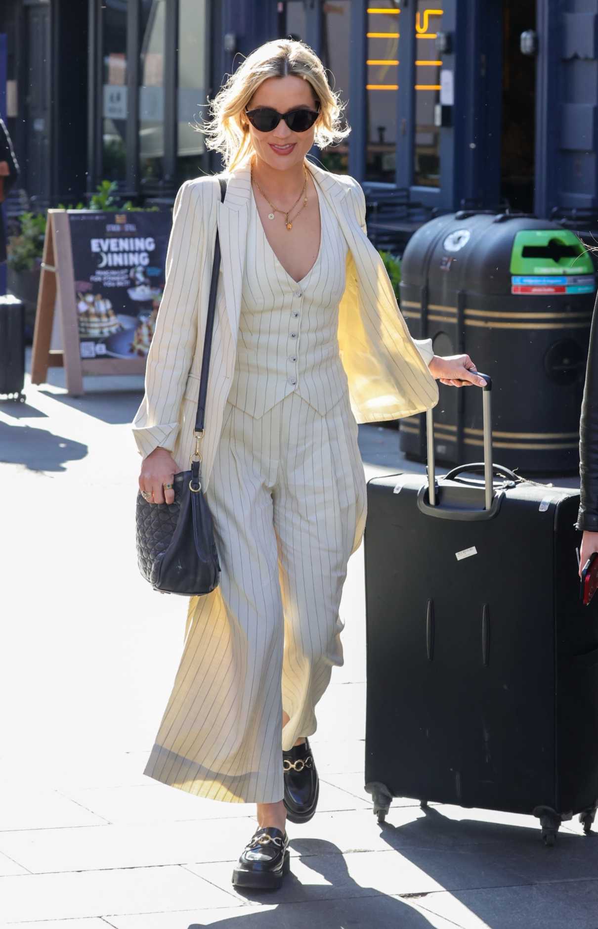 Laura Whitmore in a White Striped Trouser Suit