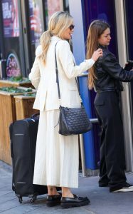 Laura Whitmore in a White Striped Trouser Suit
