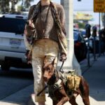 Paris Jackson in a Tan Sweater Walks Her Doberman Dog in Los Angeles 04/02/2023