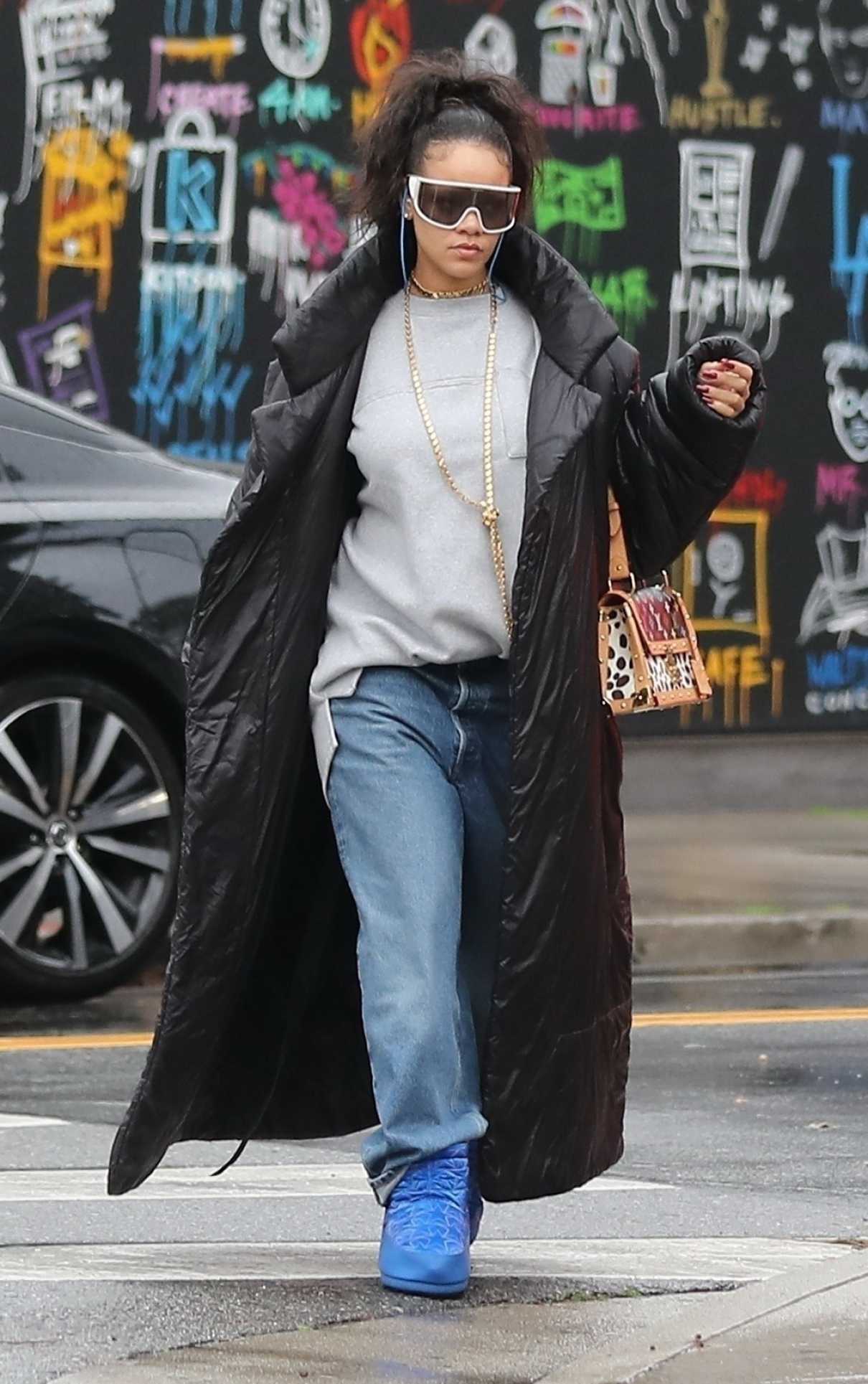 Rihanna in a Black Puffer Coat