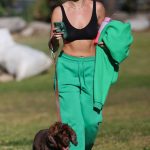 Abbie Chatfield in a Black Sports Bra Walks Her Dog in Sydney 05/10/2023