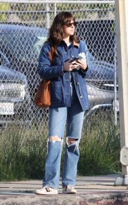 Dakota Johnson in a Blue Ripped Jeans