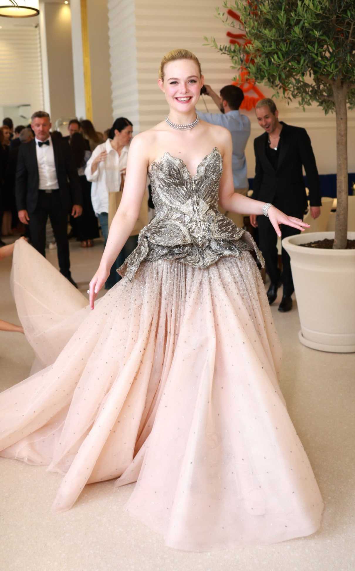 Elle Fanning Arrives at the Martinez Hotel During the 76th Cannes Film